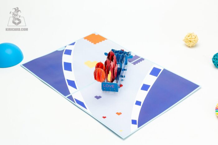 blue-truck-carrying-pixel-hearts-pop-up-card-02