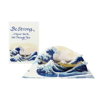 Handmade Japanese art pop up greeting card inspired by The Great Wave of Kanagawa with ocean waves, fishing boat, and Mount Fuji.